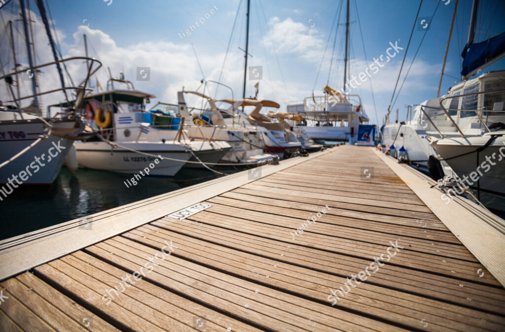stock-photo-marina-with-anchored-boats-323548532
